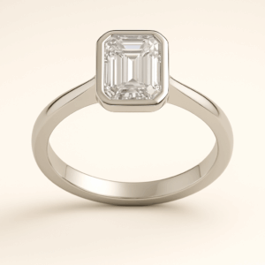 E02 - Bezel Emerald Solitaire